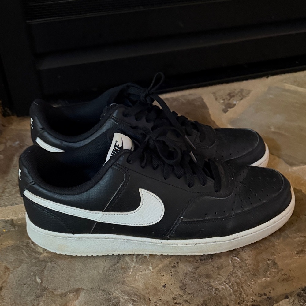 Nike Black Leather Low-Top Sneakers with White Swoosh